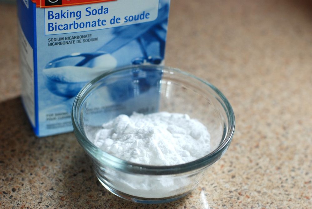 Baking soda, a natural cleaner for glass top stove cleaning.