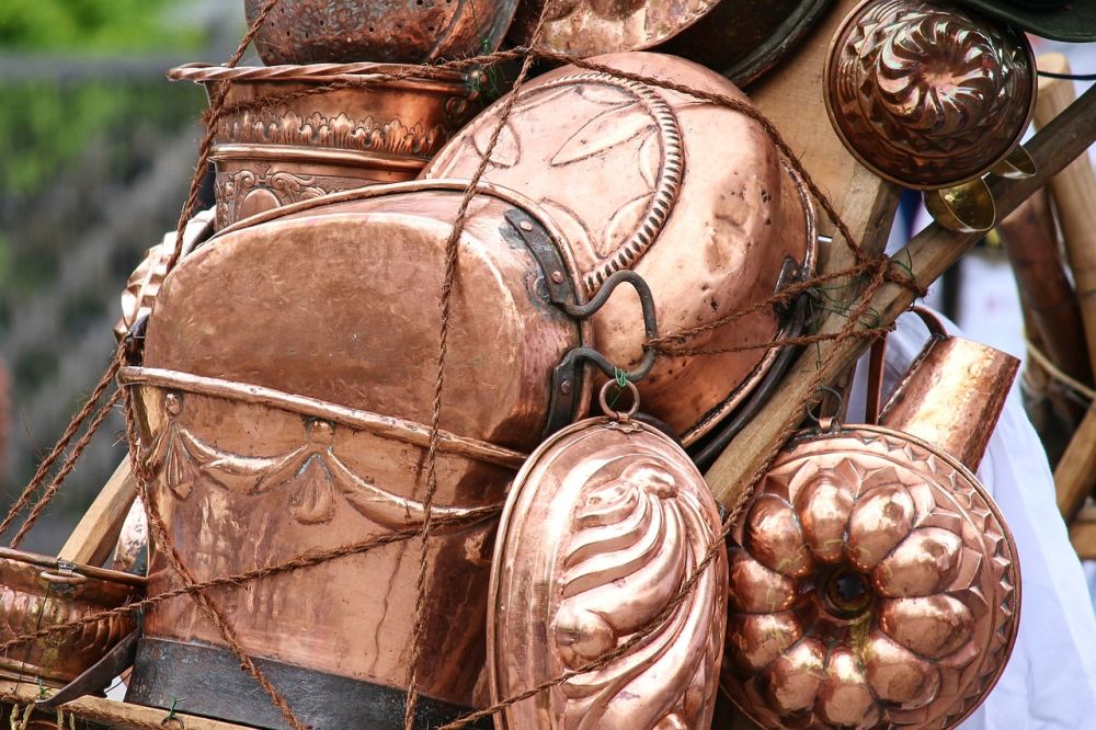 Copper cookware clean and shiny.