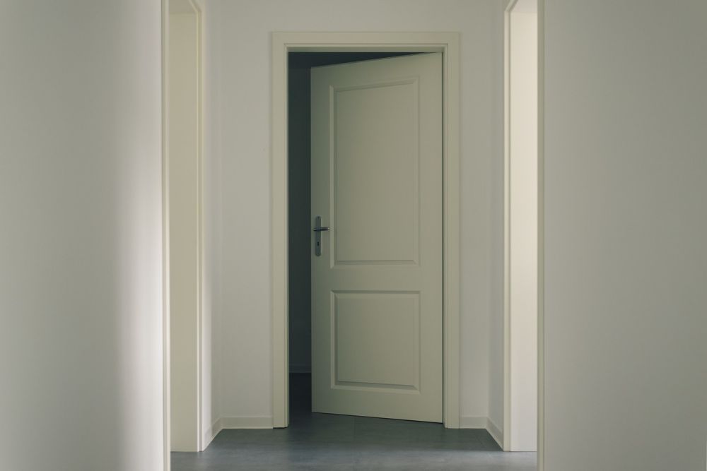 If you'd have to pick one area in the house to find dust, above the door trim could be your best bet.