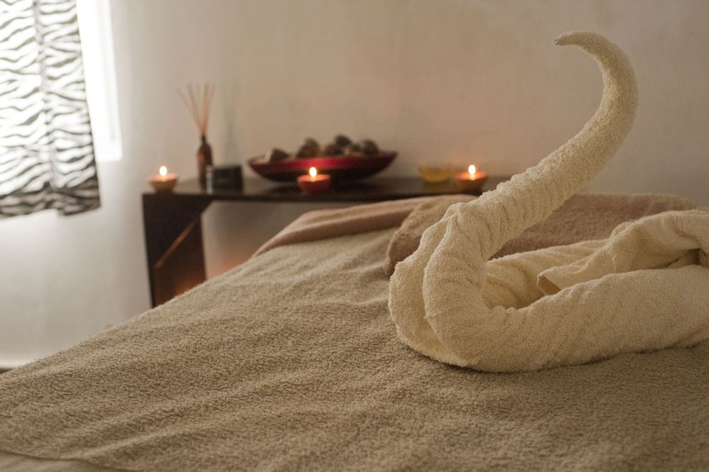 Decorated bedroom with scented candles.