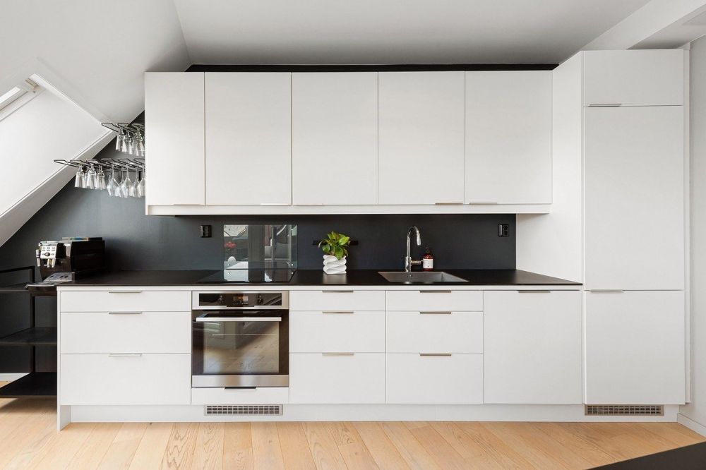 Upper parts of kitchen cabinets tend to accumulate lots of airborne grease over time.