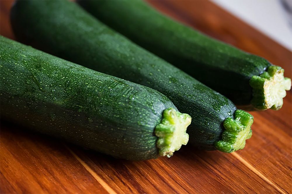 Zucchini is a mild ingredient for pizza crust.