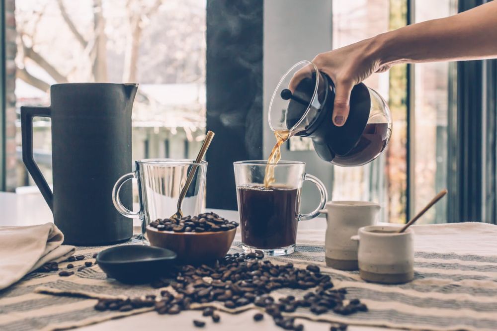 Darkly colored, bitter, and slightly acidic, coffee has a stimulating effect on humans, primarily due to its caffeine content.