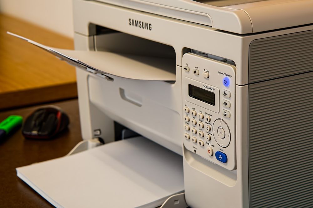 Organized home office space with a printing station.