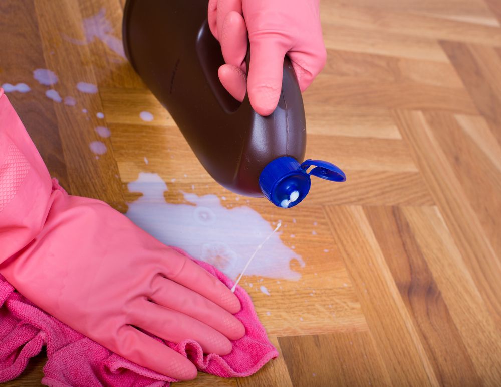 Specialized parquet or hardwood floor cleaner is good for situations when water is not enough.