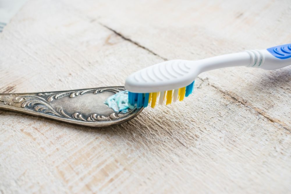 Toothpaste for removing tarnish from silver.