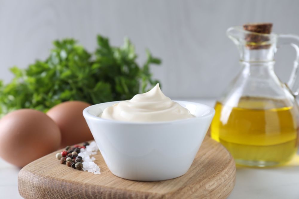 Mayonnaise can hide scratches on wooden flooring.