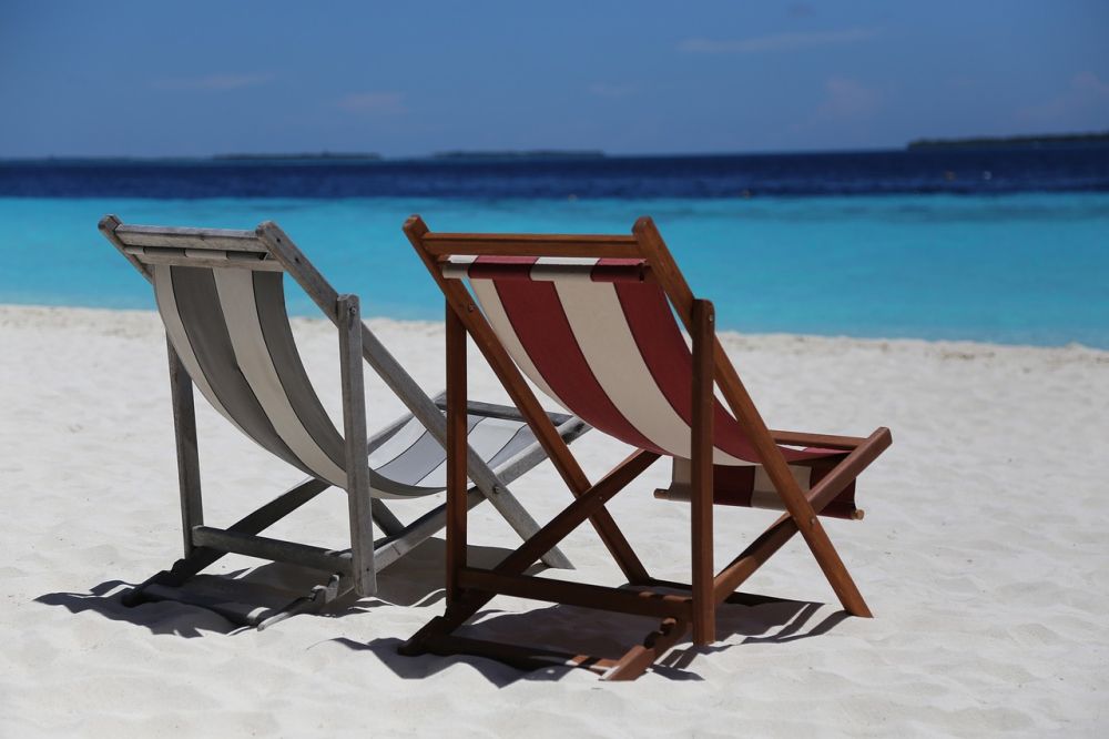 Canvas furniture by the beach.