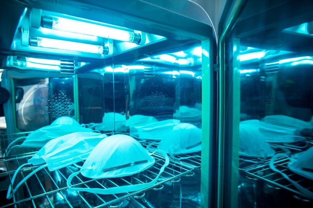 A hospital employs UV-C light sterilization to disinfect personal protective equipment (PPE). This method ensures a higher standard of cleanliness, significantly reducing the risk of healthcare-associated infections by inactivating bacteria and viruses on masks and other gear.