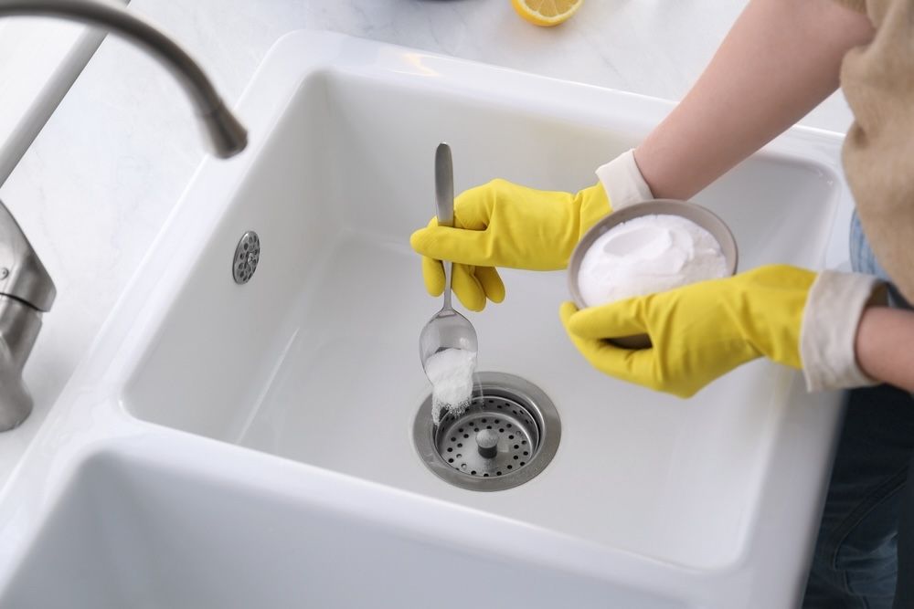 Baking soda is an excellent surface cleaner, effectively tackling grease and grime in the kitchen. It’s safe to use on a variety of surfaces, ensuring a spotless and scratch-free finish.