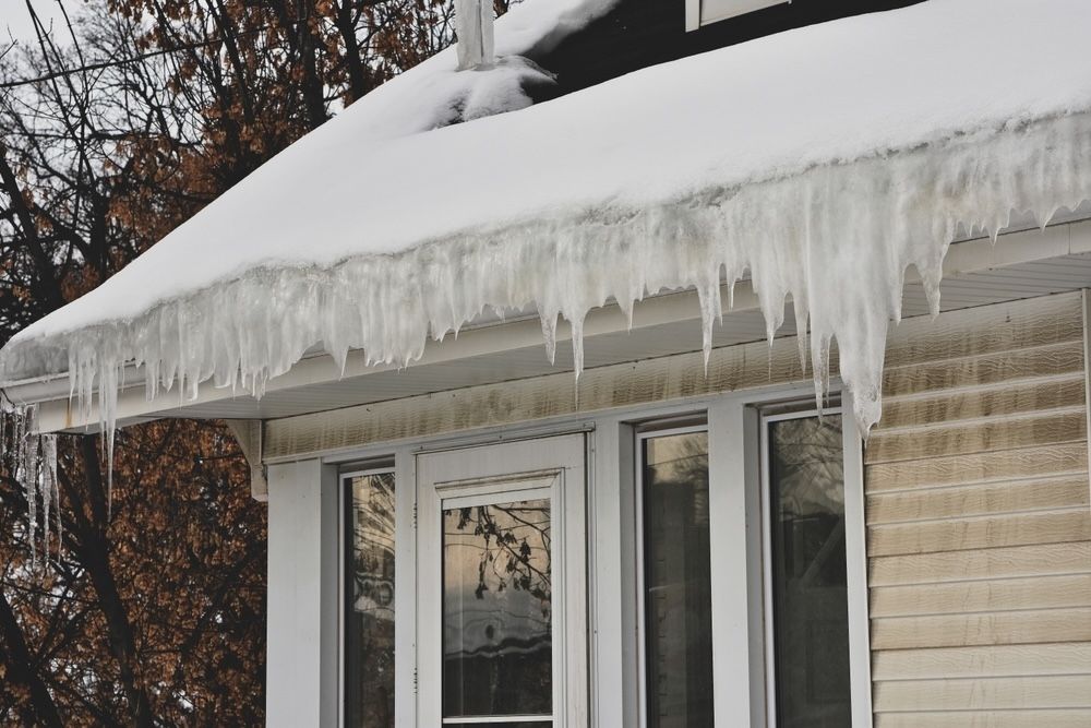 Preventing ice dams with proper attic insulation and ventilation is crucial to avoid water infiltration and damage.